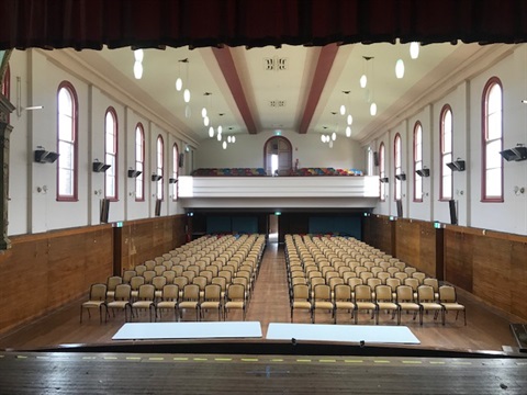 A view from the stage of the Town Hall with the chairs set up